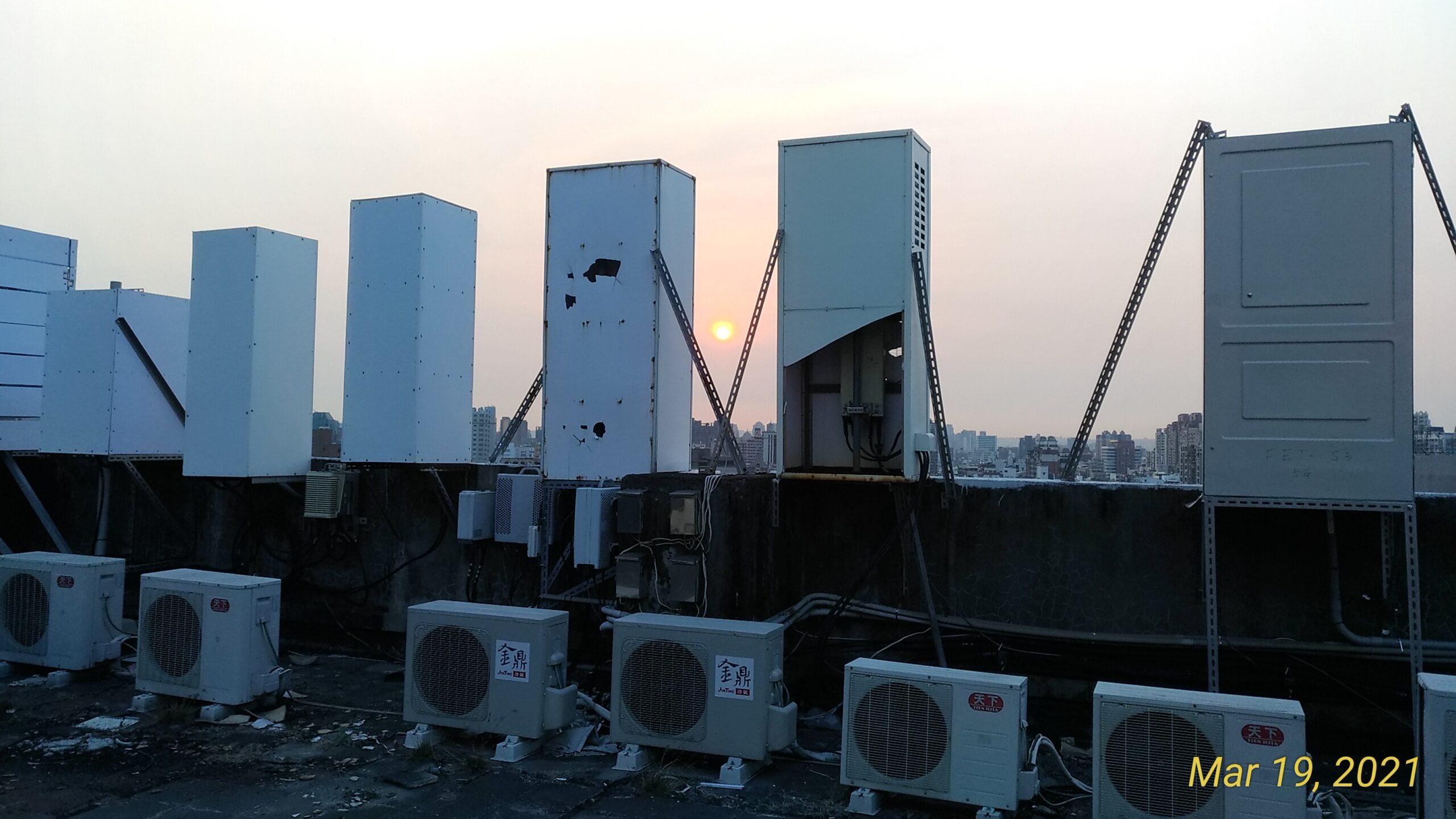 Real rooftop telecom cell cabinets and base station equipment