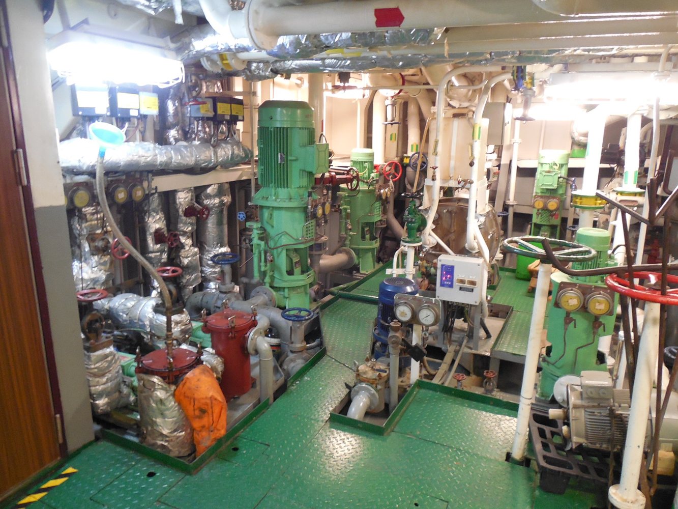 Marine engine room equipment space for cable and pipe routing environment