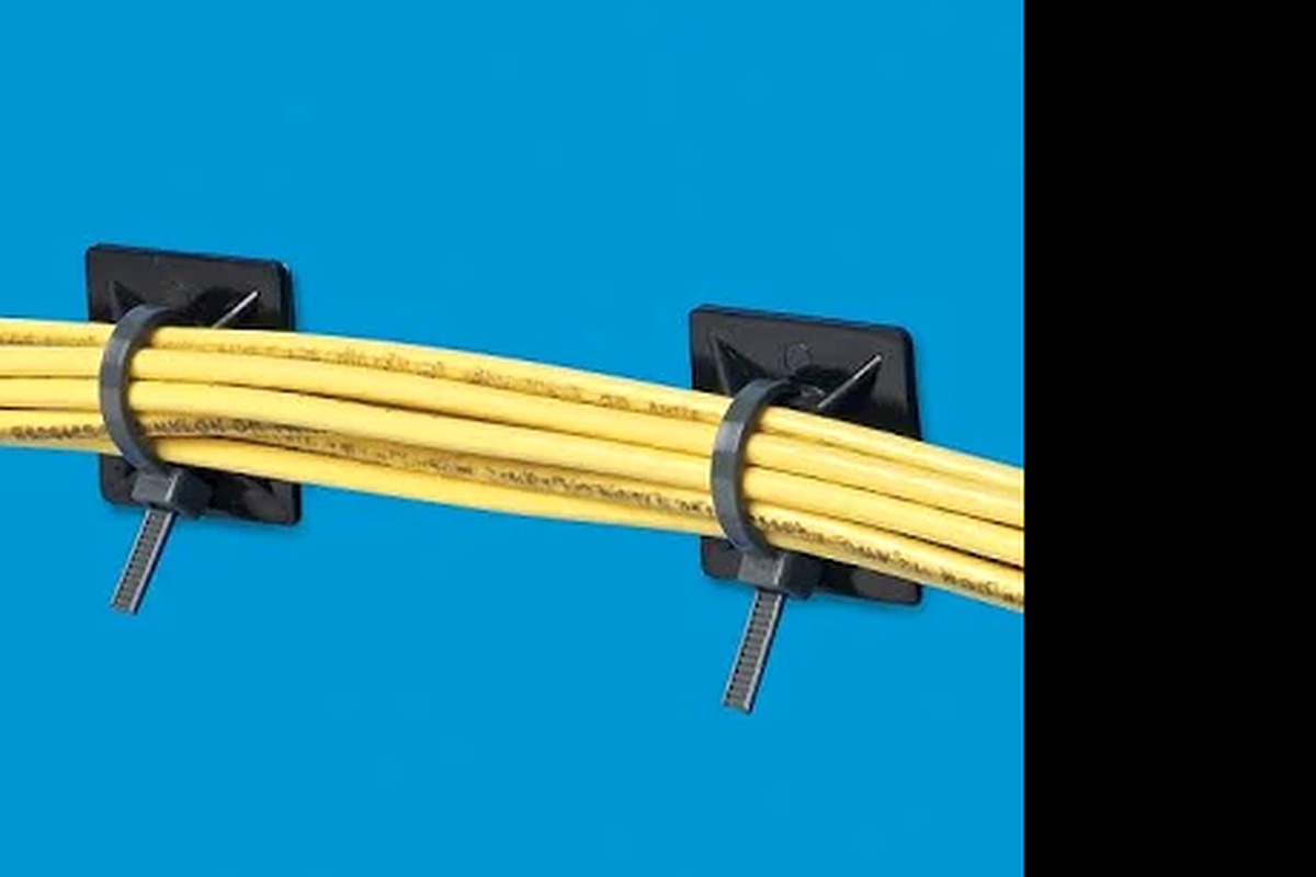 Close-up pipe and conduit support spacing with fixed cable tie bases
